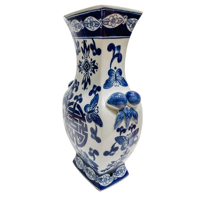 Beautiful vintage blue and white chinoiserie flower vase with a flat, square body, large double happiness symbols on two...