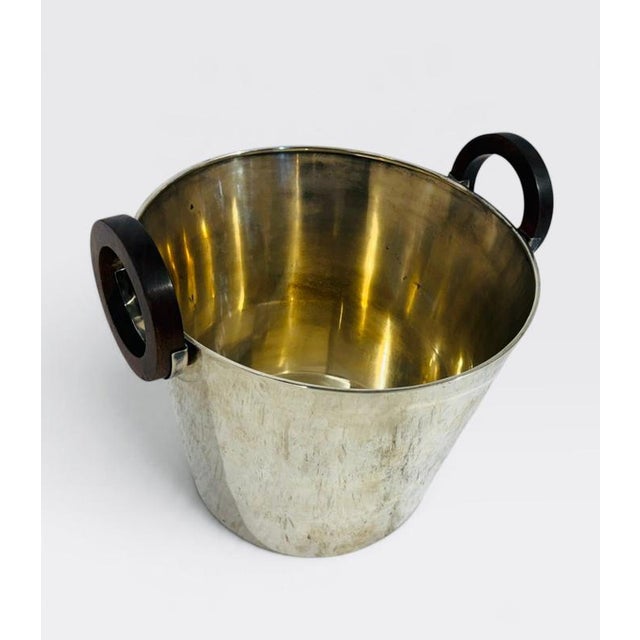 This gorgeous five bottle wine cooler features genuine wood ring handles. This generusly size bucket can hold up to five...