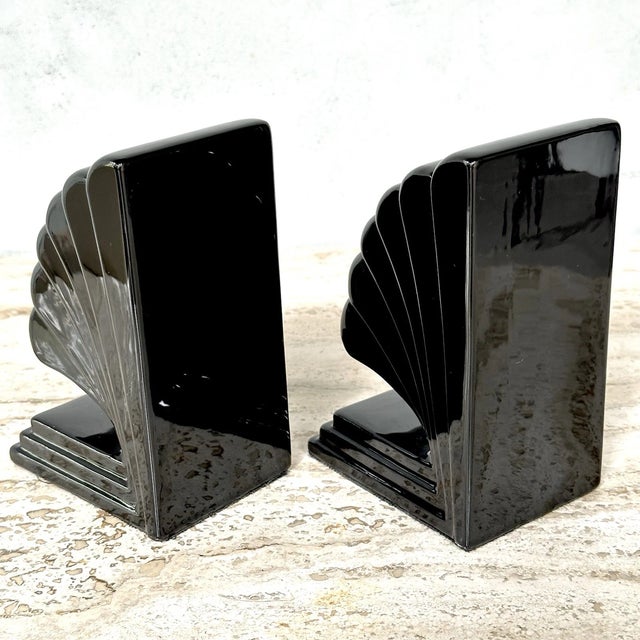 Add timeless sophistication to your bookshelf with this striking pair of Vintage Fitz and Floyd Art Deco Black Ceramic...