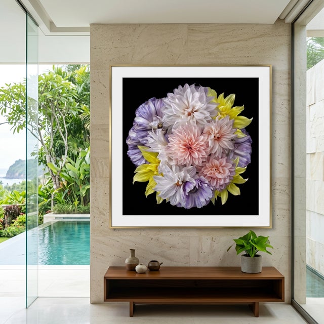 A meticulously arranged floral composition featuring layered blush and ivory dahlias, ruffled lavender anemones, delicate...