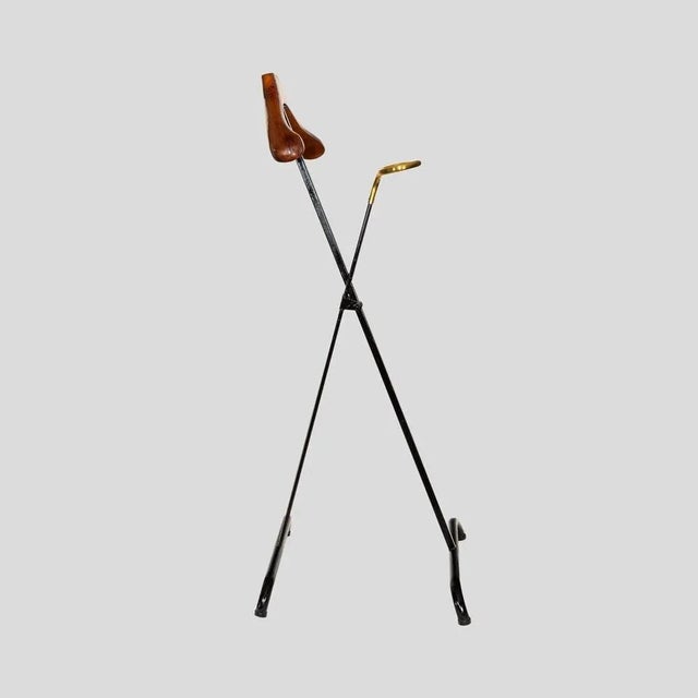 Italian mid century folding Valet Stand, black enamelled stand with brass and wooden brass by Fratelli Reguitti This piece...