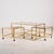 An Italian brass coffee table with a bamboo-like structure from the 1970s. The coffee table includes two smaller side...