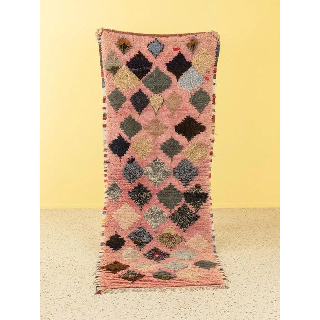 This is a boujad vintage Berber carpet, which consists of high-quality new wool and recycled textiles. It is soft and cozy...