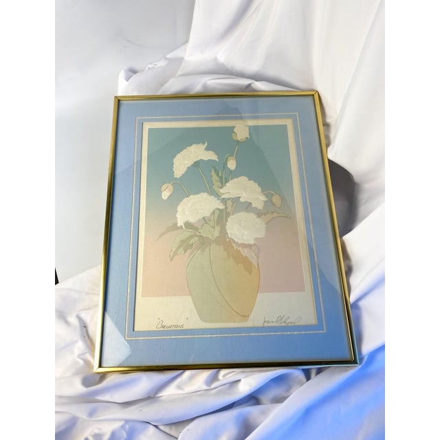 Original signed embossed lithograph by listed artist David Allgood, "Carnations" 1984. Matted in blue and framed in gold...