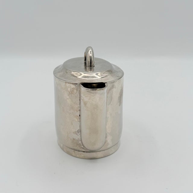 A striking vintage Art Deco individual teapot closely following the celebrated tea-service design created by Gio Ponti for...