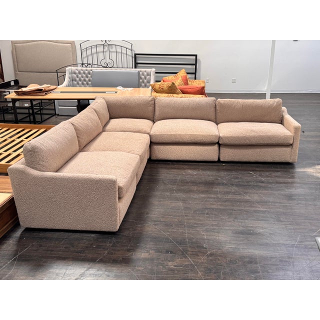 Design Plus Gallery presents the Slope Sectional by Revelation for Uttermost. Lounge in pure decadence with this fully...