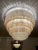 Murano chandelier designed by Gino Poli, for Aureliano Toso, circa 1966." This extraordinary chandeliers is composed by...