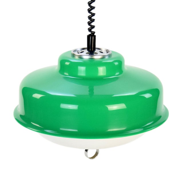 Ceiling lamp by Meblo, made in the 1970s. A striking pendant light produced by Meblo in collaboration with Guzzini,...