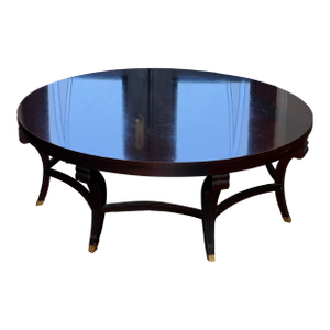 Attributed to Hickory Chair Company Flame Mahogany Round Coffee Table With Brass Sabots