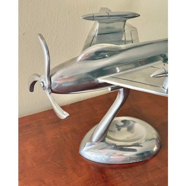 Stylish midcentury Art Deco futuristic chrome plane model prototype model on stand. Please see condition details noted....