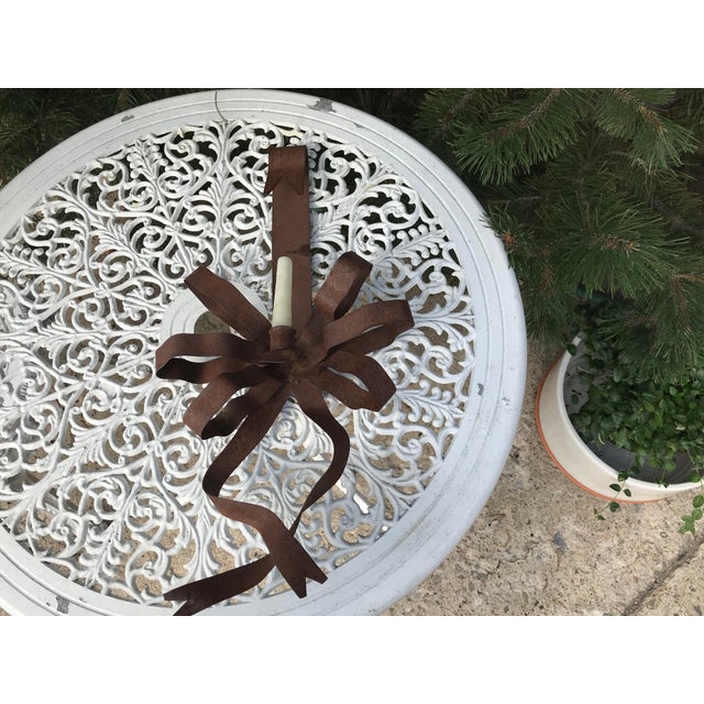 Wonderful Rustic wall sconce with rust finish; charming on patio or any room.