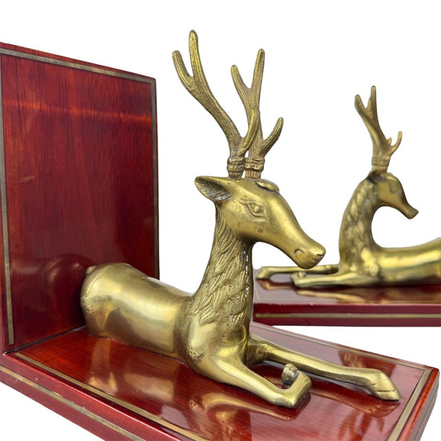 Set of 2 brass deer figurines mounted on wood. Each bookend weighs around 3 pounds, making them excellent for holding back...