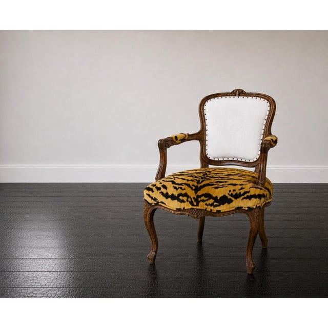 Authentic period French Louis XV Fauteuil , c. 1760-1780. A beautiful intricately carved and detailed walnut frame...