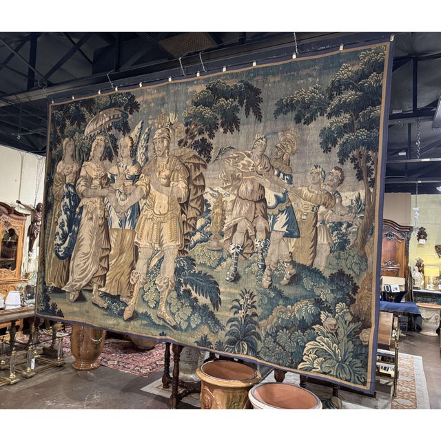 This monumental 18th century Flemish verdure tapestry, woven circa 1780, measures over ten-and-a-half feet wide and...