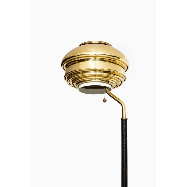 - Very rare and early floor lamp - Model A 808 designed by Alvar Aalto - Produced by Valaistustyö in Finland - Brass base...