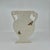Handmade ceramic Silhouette vase with sculpted hand painted moths. These silhouette vases are shallow enough to sit on a...
