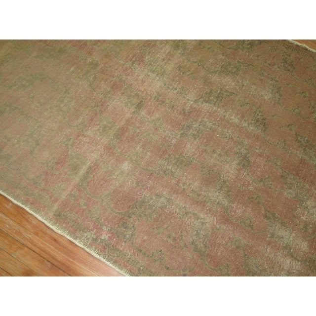 A vintage Turkish Anatolian in predominant blush pink tone.