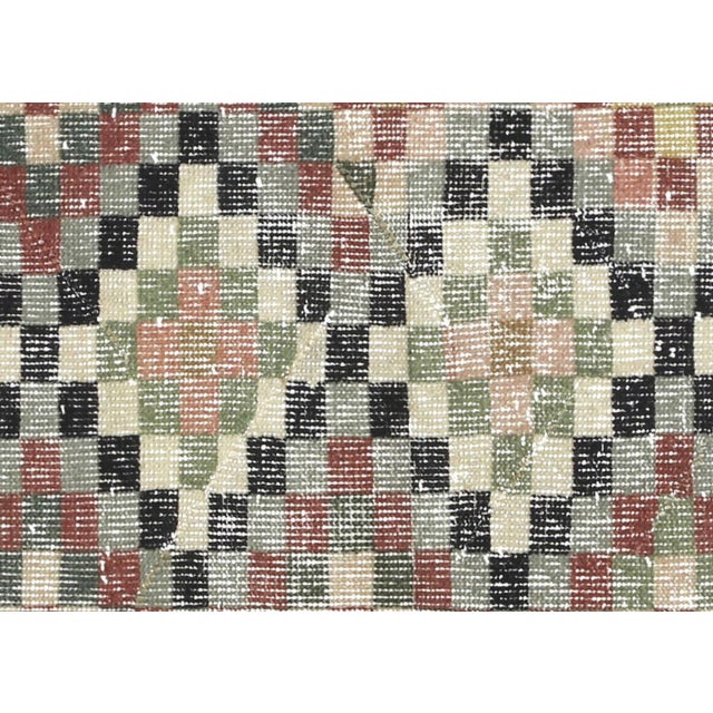 Handcrafted in the Sparta region of Western Turkey, this Vintage Turkish Mid-Century-Modern Rug features a striking...