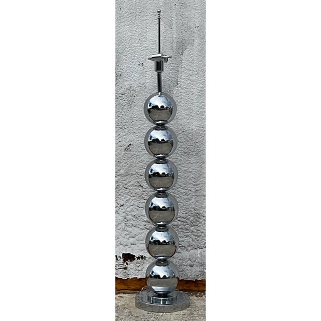 Illuminate your home with the Vintage Boho Chrome Floor Lamp After Kovacs. This stunning piece from Brown Jordan combines...