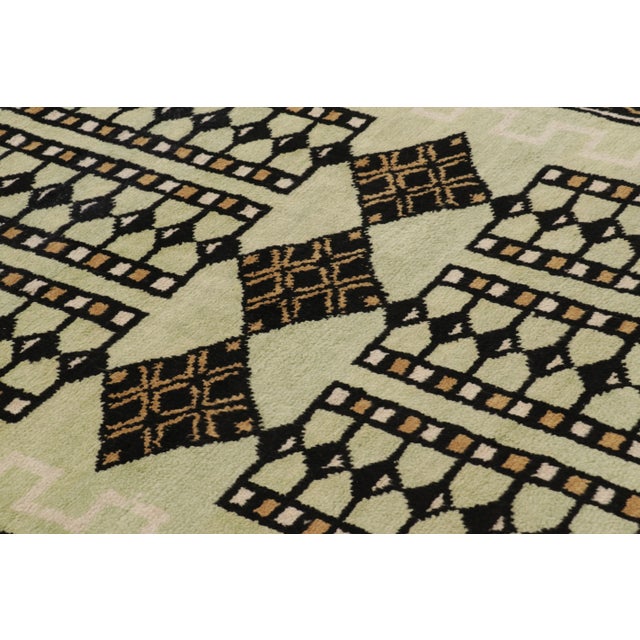 This 6x9 contemporary rug from Rug & Kilim’s Art Deco collection is a brilliant celebration of architectural design. Hand-...