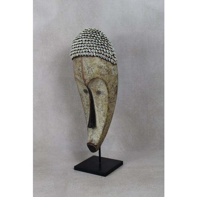 Well known for their reliquary figures the Fang also danced finely sculpted masks during a number of ritual activities....