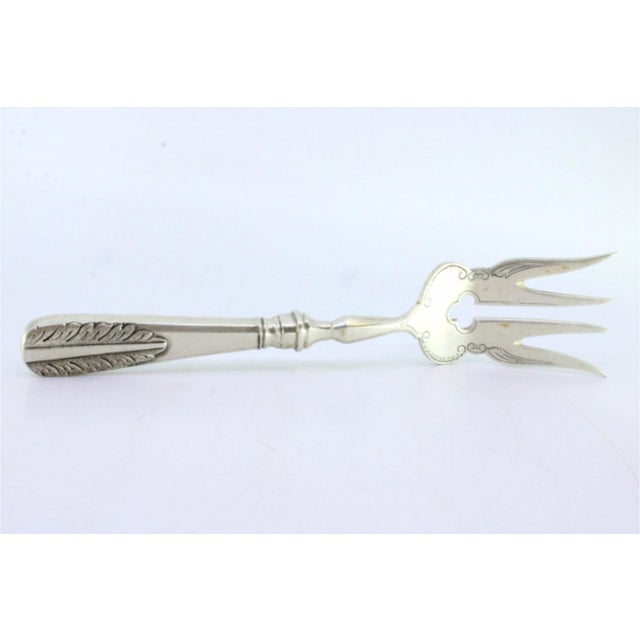 Metal Silver Fish Serving Fork with Floral Motifs in Relief on the Handle For Sale - Image 7 of 8