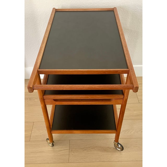 Wood Mid Century Danish Modern Teak Trolley Bar Cart With 3 Slate Shelves For Sale - Image 7 of 14