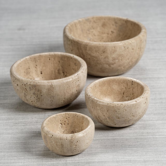 Elevate the sophistication of your home decor with this stunning travertine bowl. Constructed from travertine marble in a...