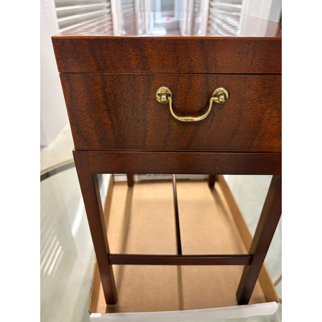Beautiful Baker chest on a stand. May be used as accent table or side table. The chest top is hinged. This item is often...