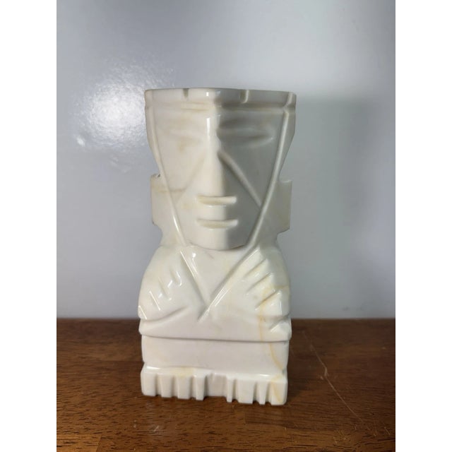 Vintage carved marble figural bookend featuring a geometric face design in a creamy ivory tone. Measures approximately 8...