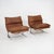 The “Onda” armchairs, designed by Giovanni Offredi for Saporiti in the 1970s, are among the most representative examples...