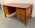 Stunning Mid-Century Danish Modern executive desk by Art Furn of Denmark. Expertly crafted in richly grained teak, this...