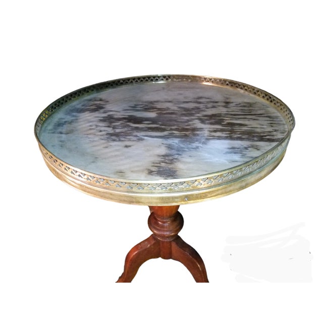 Queen Anne Style Plant Stands in Mahogany, each with circular Top with Brass Surround. 1940's This is the original stain...