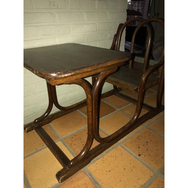 Beech childrens school bench and desk signed by Thonet in the catalogue 1904 Label, circa 1900. This piece has an...