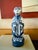 A striking vintage blue and white porcelain monkey figure rendered in a rich cobalt glaze with traditional Asian-inspired...