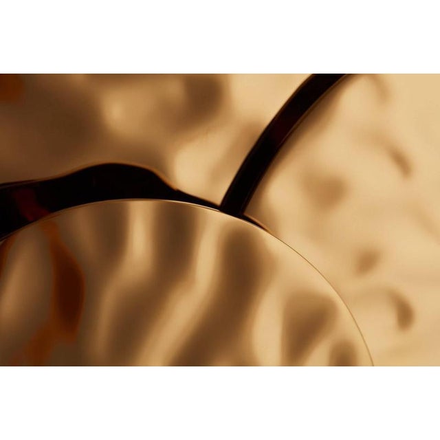 Multiple liquid wall lamp by jennifer midoz dimensions: d 38 x w 7 x h 39 cm materials: pale gold on textured polished...