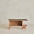 A French Modernist coffee table designed in the manner of Guillerme et Chambron, from the 1960s, crafted in oak. The...