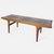 A striking mid-century g plan teak coffee table featuring a distinctive ceramic tile top, embodying the bold geometric...