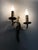 Antique double-light bronze wall sconce with acanthus leaf design. 1950s Bronze wall sconce, the sconce topped with two...
