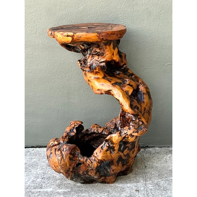 Sculpted naturally by time and hand-finished by artisan hands, this vintage 20th-century Japanese pedestal is carved from...