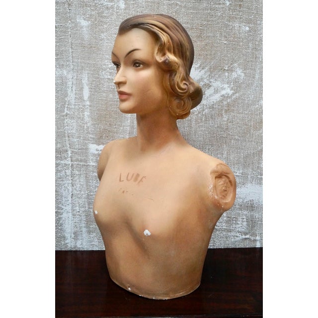 An original Art Deco shop mannequin. Made from plaster from the Lubé brand in Paris representing a female bust, from the...