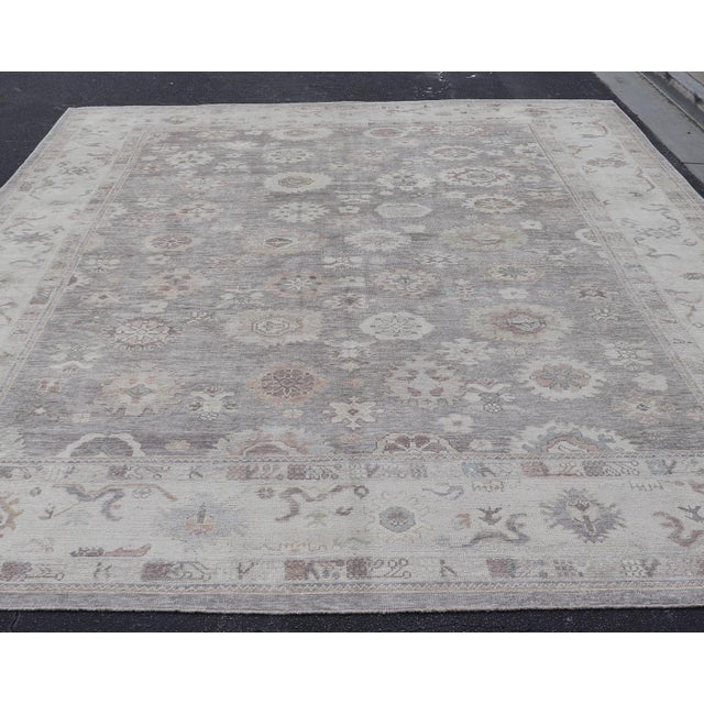 Large Turkish Oushak Rug in Soft Gray, Ivory, and Taupe With Floral Motifs For Sale - Image 10 of 16