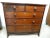 This Victorian Mahogany Chest of Drawers is a beautiful antique piece from the 19th century, featuring a solid mahogany...