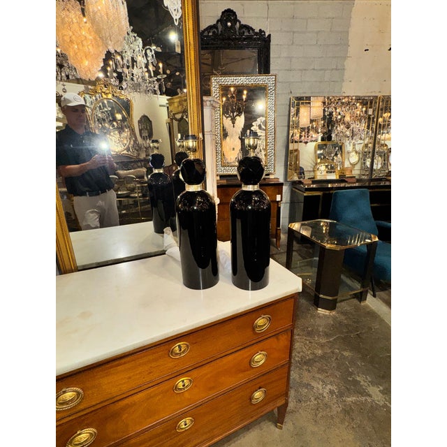 This product is a pair of black Murano glass cone form lamps. The elegant design and unique craftsmanship of the Murano...