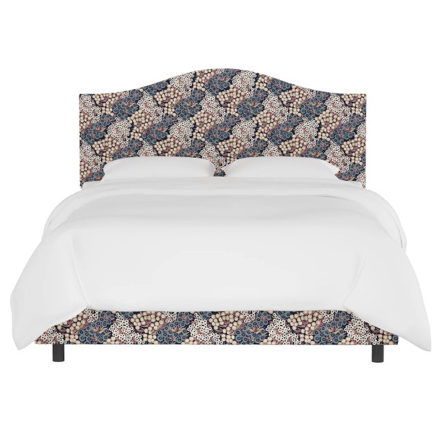 This fully upholstered bed has a unique headboard shape, allowing you to chart a course for a bedroom retreat that is at...