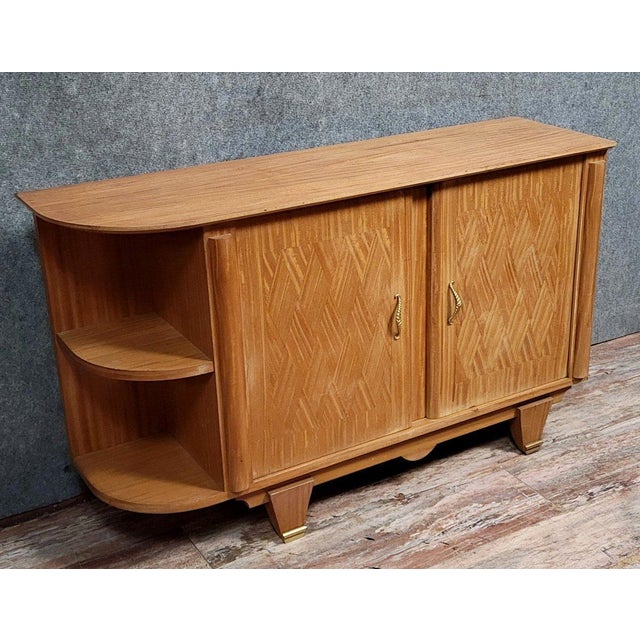 According to Jules Leleu: a rare Art Deco marquetry sideboard, circa 1930. This piece can serve as a room divider as it is...