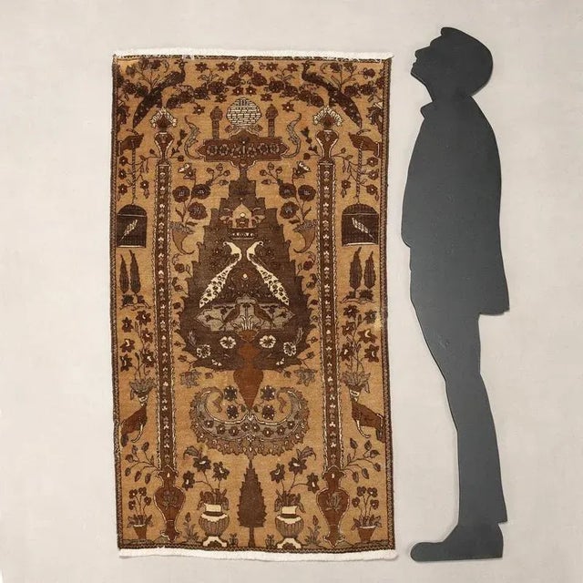 Antique cotton and wool rug, large knot, hand-made. This piece is attributed to the mentioned designer/maker. It has no...