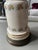 This item is a vintage floral printed porcelain oil lamp base, likely electrified, featuring a delicate ceramic reservoir...