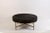 Chic 'Tambour' antiqued brass and dark brown hide ottoman by Design Frères. 38 in. diameter x 16.5 in. tall (other sizes...