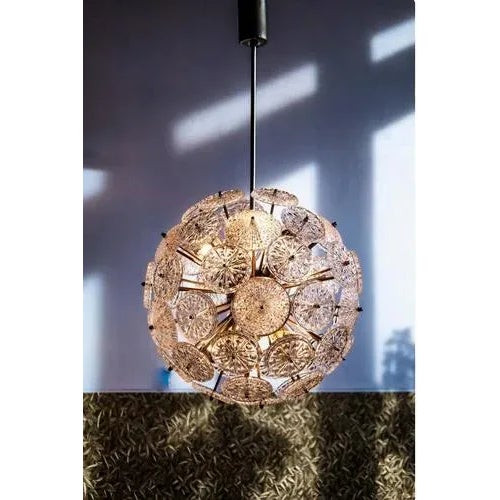 This beautiful designed crystal glass flower starburst chandelier from the early 1960`s, with 52 mint glass flowers,...